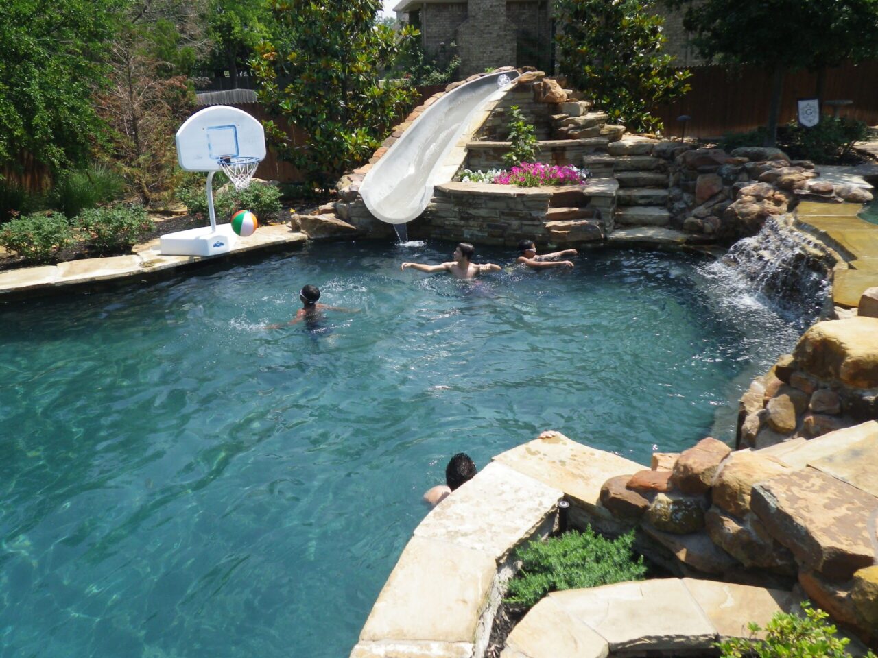 Kids playing with audio in the pool.